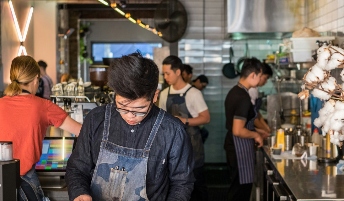 People working at a cafe